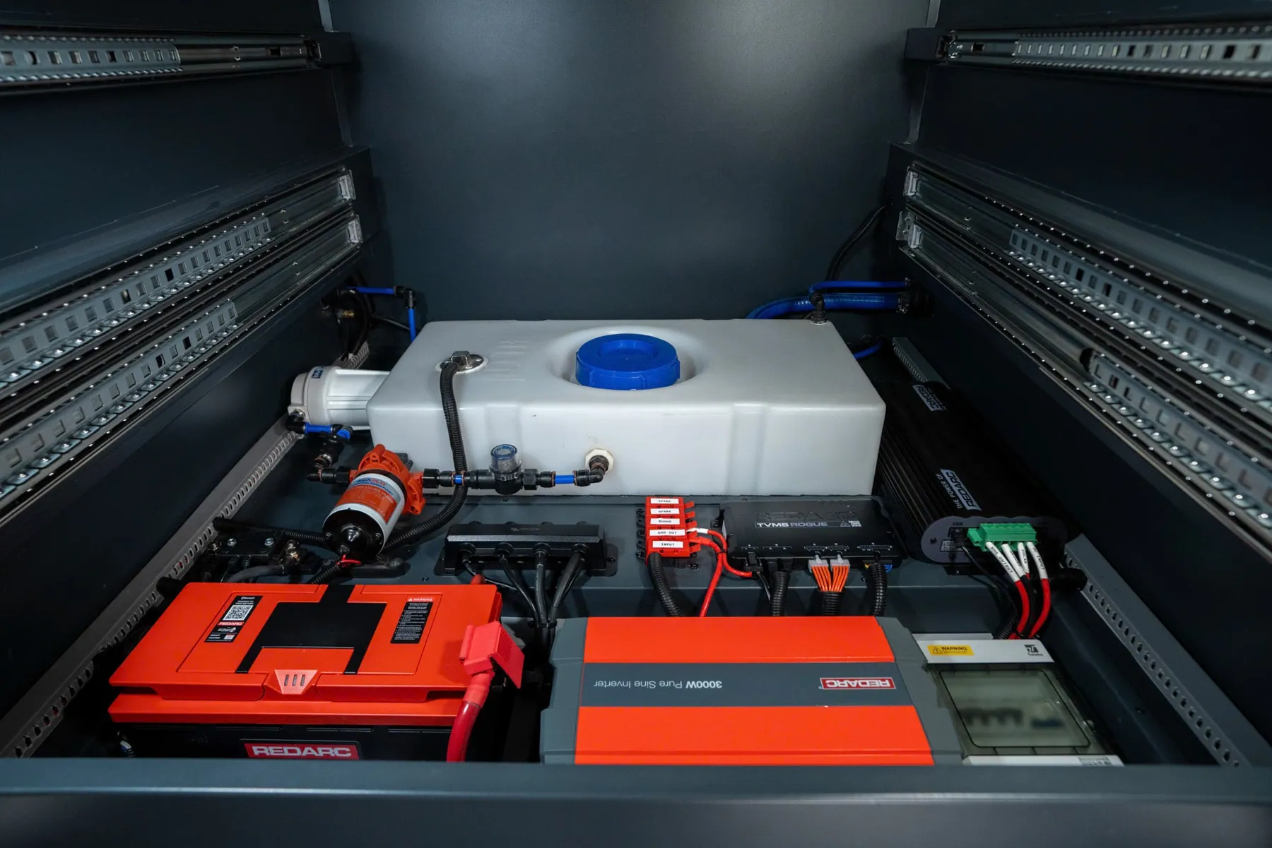 Trailer power compartment with lithium battery management and charging equipment