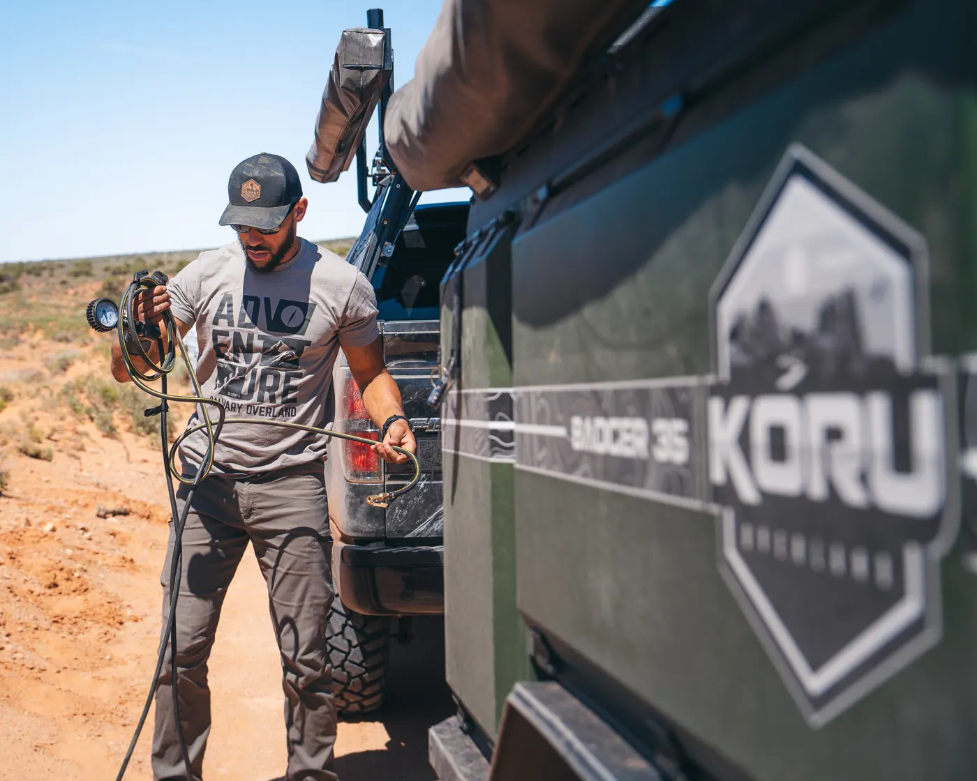 Koru Badger 35 in Ranger Green on the trail
