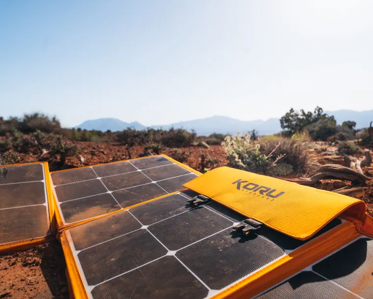 Koru solar blankets deployed on red desert ground